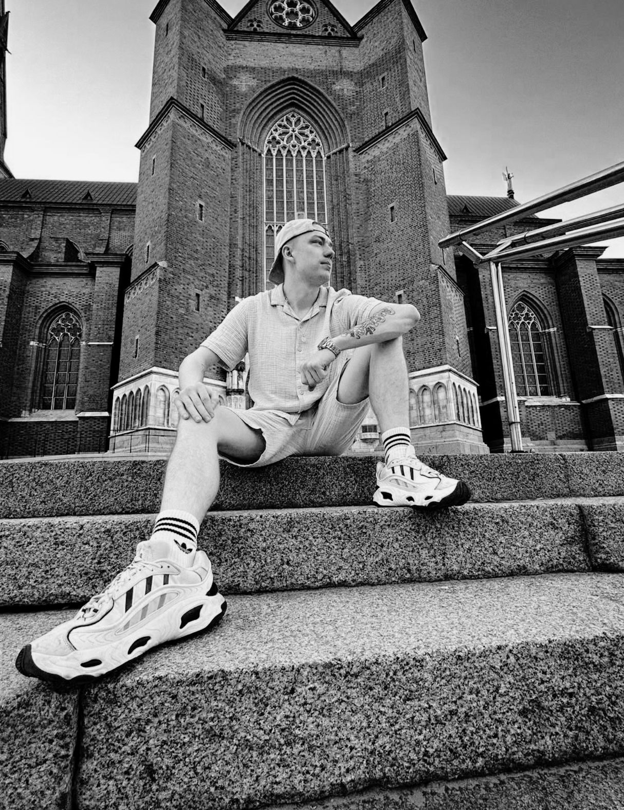 Portrait of Bisken sitting on steps